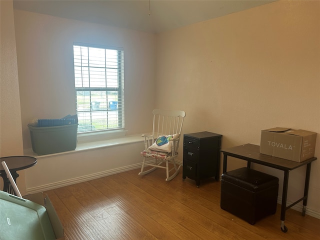 sitting room with wood finished floors