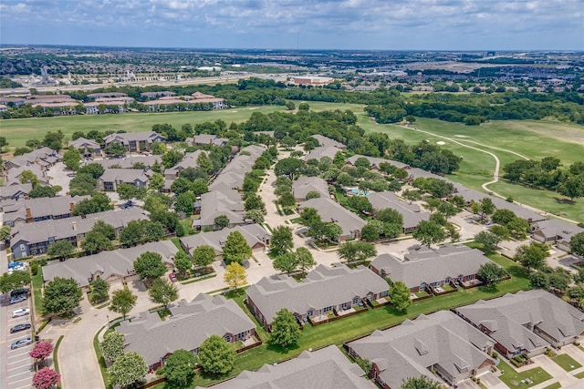 birds eye view of property with a residential view and view of golf course