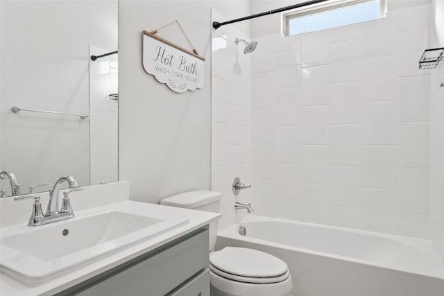 full bathroom featuring shower / bathing tub combination, vanity, and toilet