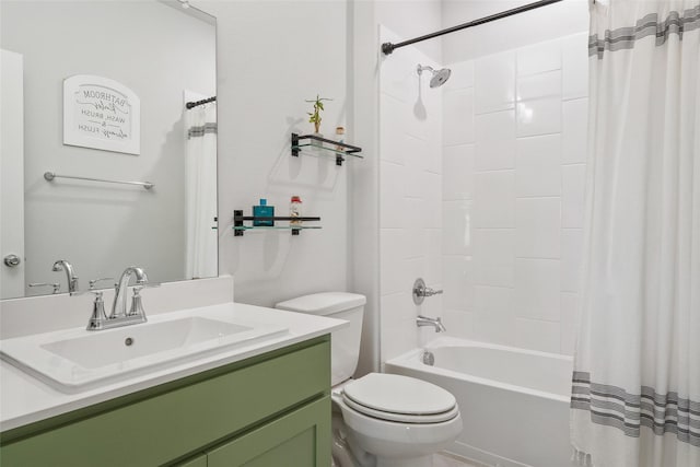 full bathroom featuring shower / bath combo, vanity, and toilet