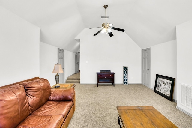 living area featuring a ceiling fan, lofted ceiling, visible vents, and light carpet