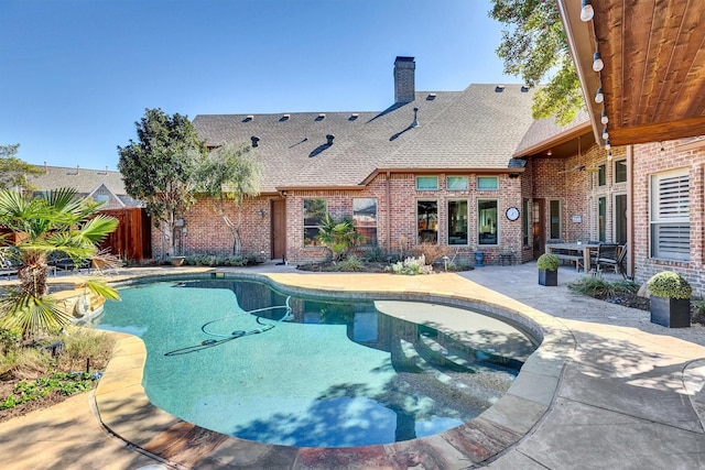 view of pool with a fenced in pool, a patio, and fence