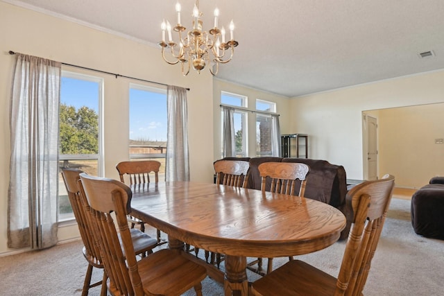 dining area featuring light carpet, visible vents, and a chandelier