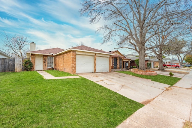 view of front facade featuring fence, driveway, a front lawn, a garage, and brick siding