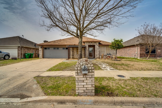 view of front facade with a garage, concrete driveway, and brick siding