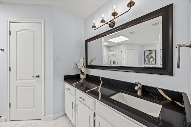 full bath with visible vents, baseboards, marble finish floor, vanity, and a shower stall