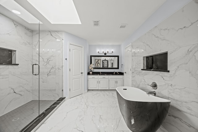 full bathroom featuring a marble finish shower, visible vents, marble finish floor, vanity, and stone wall