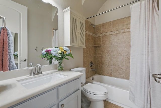 bathroom with tile patterned flooring, toilet, vanity, and shower / bath combo