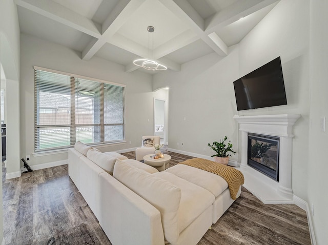 living area featuring wood finished floors and baseboards