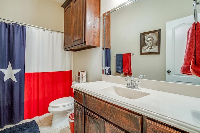 bathroom featuring tile patterned flooring, a shower with shower curtain, vanity, and toilet