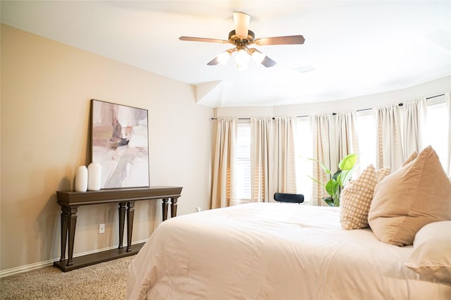 bedroom featuring baseboards, carpet, and a ceiling fan