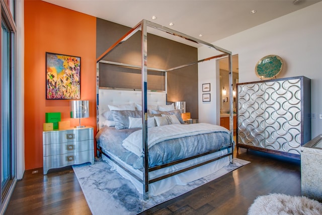 bedroom featuring wood finished floors