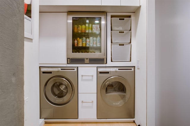 laundry area featuring laundry area and washer / dryer