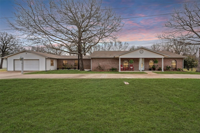 116 Walker Trce, Streetman, TX 75859 - view of front of house featuring a yard, driveway, and brick siding