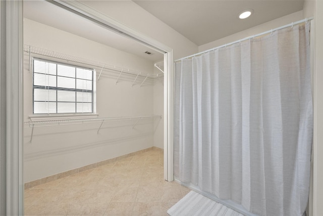 spacious closet with visible vents