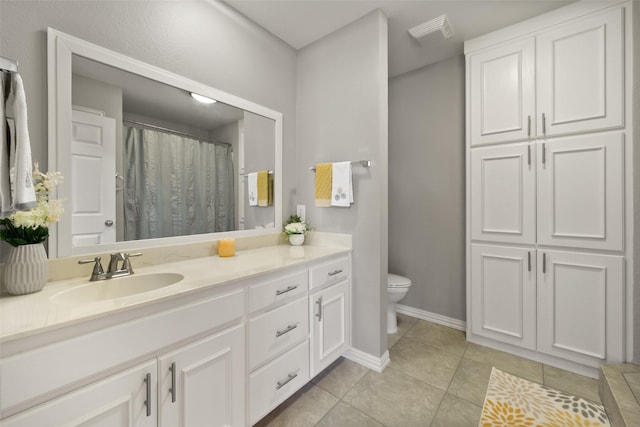 full bath featuring a shower with curtain, toilet, vanity, tile patterned flooring, and baseboards