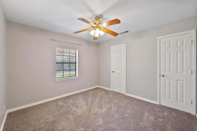 116 Walker Trce, Streetman, TX 75859 - unfurnished bedroom with carpet, baseboards, and a ceiling fan