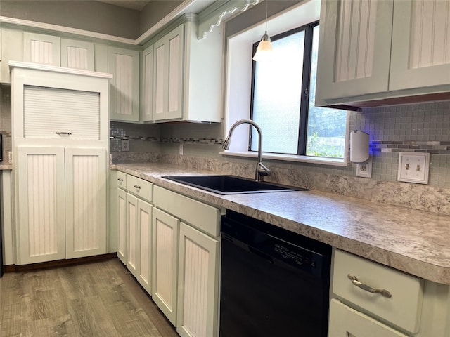 806 Robindale Ln, Fairfield, TX 75840 - kitchen featuring dishwasher, backsplash, light wood finished floors, and plenty of natural light