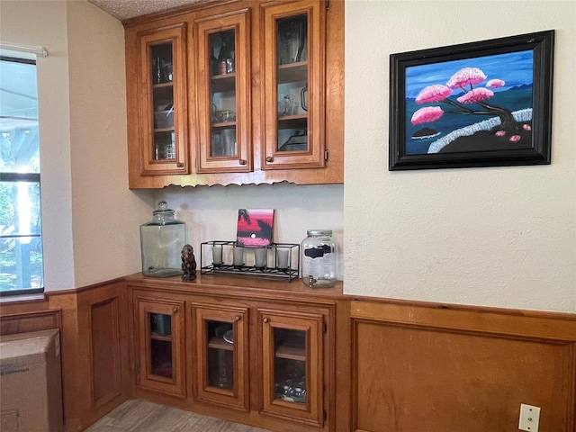 bar featuring wainscoting