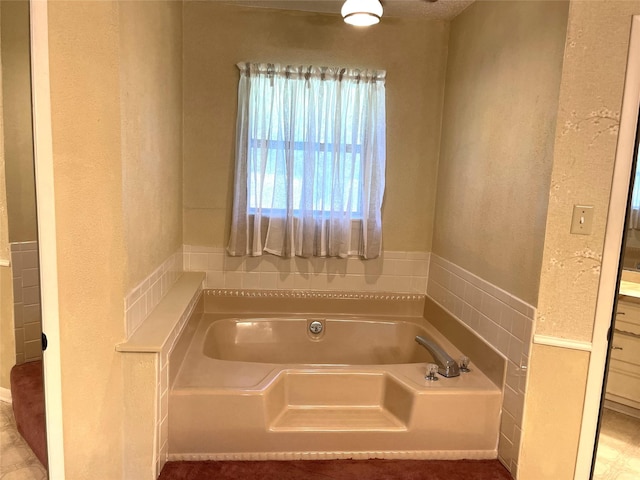 bathroom featuring a garden tub