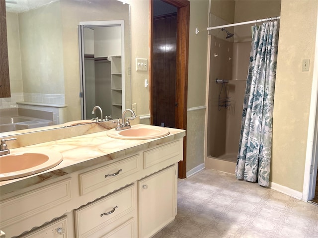 806 Robindale Ln, Fairfield, TX 75840 - full bathroom with a shower stall, double vanity, tile patterned floors, and a bath
