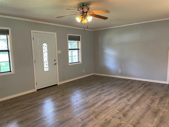 806 Robindale Ln, Fairfield, TX 75840 - entryway with plenty of natural light, ceiling fan, wood finished floors, a textured ceiling, and crown molding