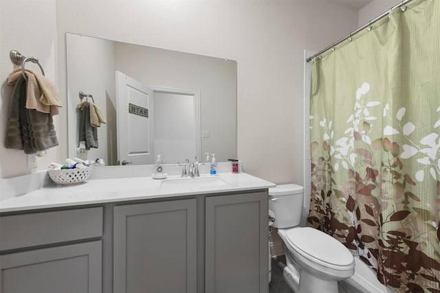 3512 Tunnel Ave, Aubrey, TX 76227 - bathroom featuring toilet, vanity, a textured wall, and a shower with curtain