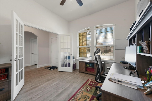 3512 Tunnel Ave, Aubrey, TX 76227 - home office featuring french doors, a ceiling fan, arched walkways, light wood-style flooring, and baseboards