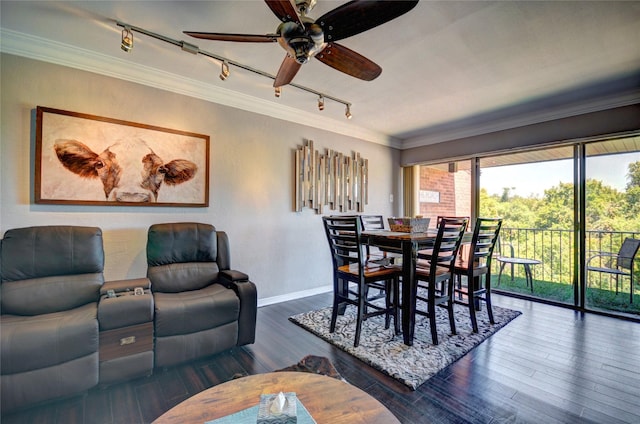 dining area with ceiling fan, ornamental molding, wood finished floors, and baseboards