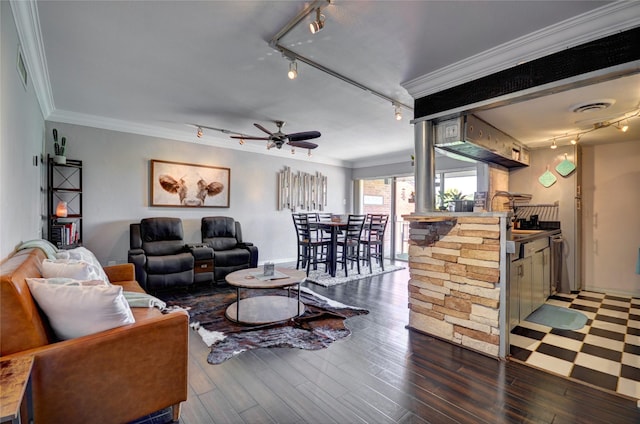 living room featuring ornamental molding, visible vents, track lighting, and wood finished floors