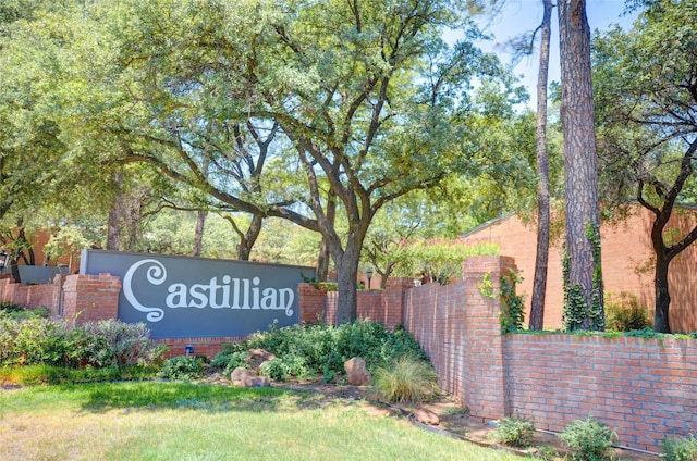 community sign with fence