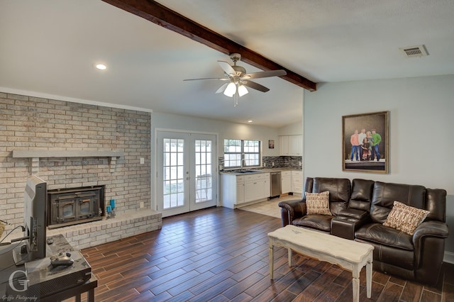 living area featuring french doors, vaulted ceiling with beams, visible vents, a ceiling fan, and wood tiled floor