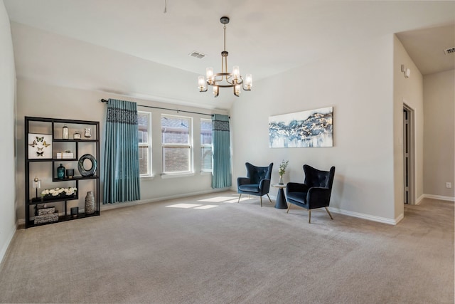 sitting room with lofted ceiling, visible vents, baseboards, carpet, and an inviting chandelier