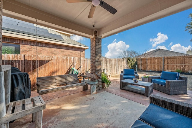 view of patio / terrace featuring ceiling fan, a grill, outdoor lounge area, and a fenced backyard