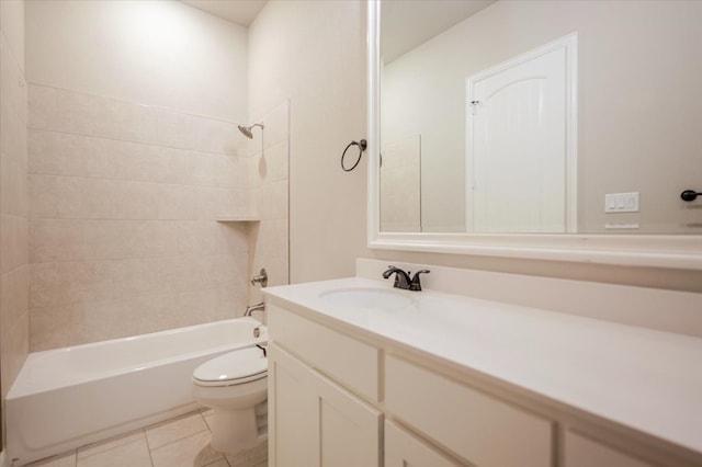 bathroom featuring tub / shower combination, vanity, toilet, and tile patterned floors