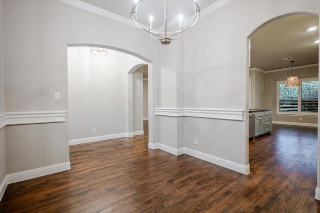 empty room with baseboards, arched walkways, dark wood-type flooring, and ornamental molding