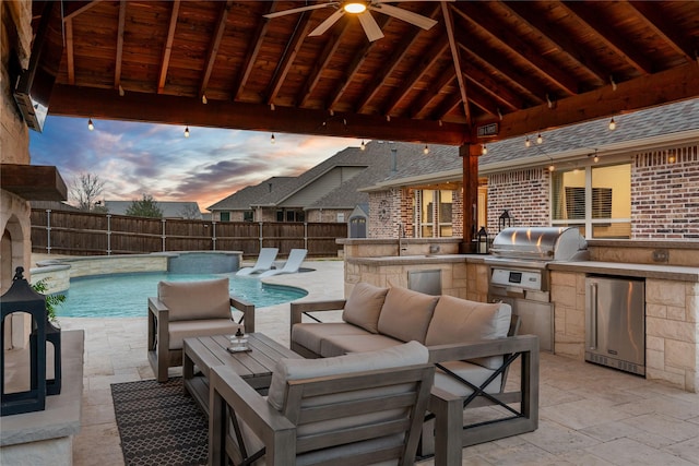 view of patio / terrace with an outdoor hangout area, a gazebo, area for grilling, and a fenced backyard