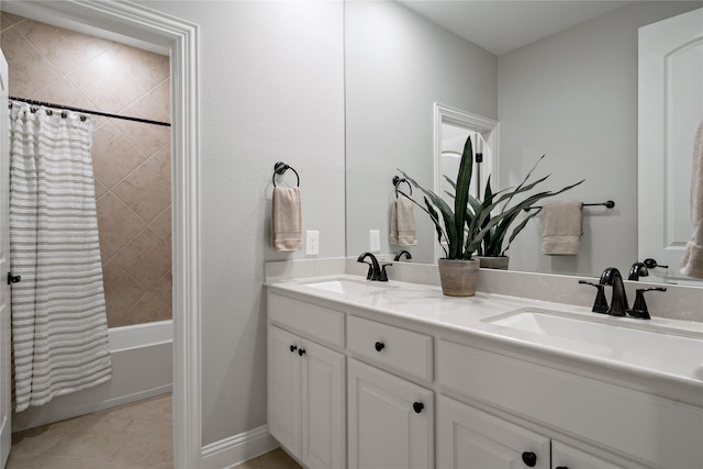 full bath with double vanity, shower / bathtub combination with curtain, a sink, and tile patterned floors