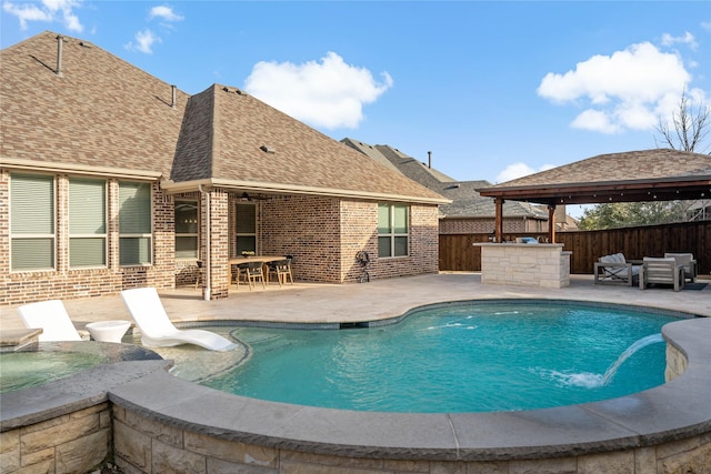 view of swimming pool featuring a fenced in pool, a patio area, and fence