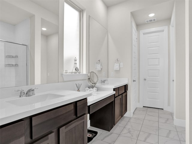 full bath featuring recessed lighting, visible vents, baseboards, marble finish floor, and a tile shower