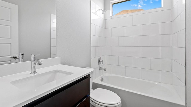 full bathroom featuring shower / bathtub combination, a textured wall, vanity, and toilet