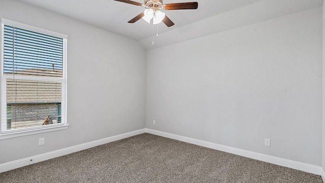 unfurnished room with carpet floors, baseboards, a ceiling fan, and lofted ceiling