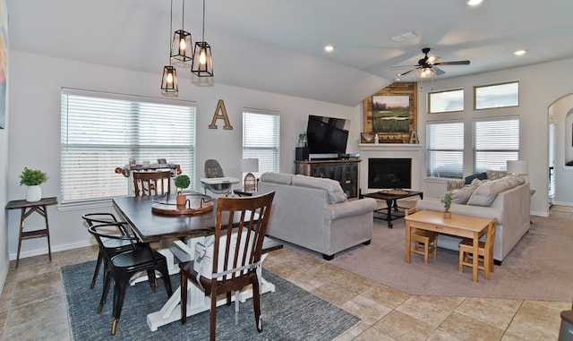 dining space featuring visible vents, baseboards, a ceiling fan, vaulted ceiling, and recessed lighting