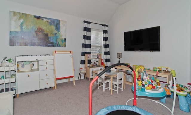 rec room with lofted ceiling and carpet