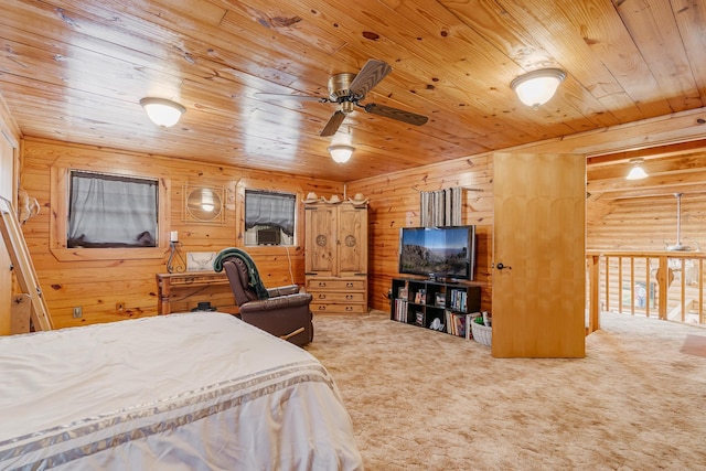 carpeted bedroom with wood ceiling and wood walls