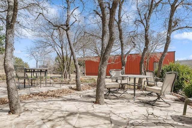 view of patio featuring outdoor dining space