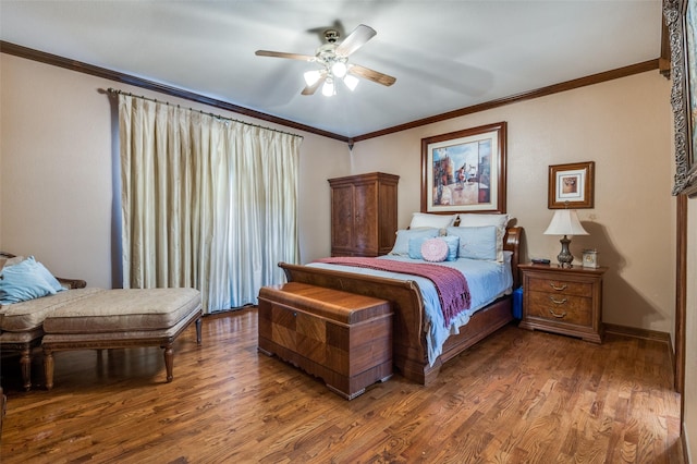 bedroom with ceiling fan, wood finished floors, and crown molding