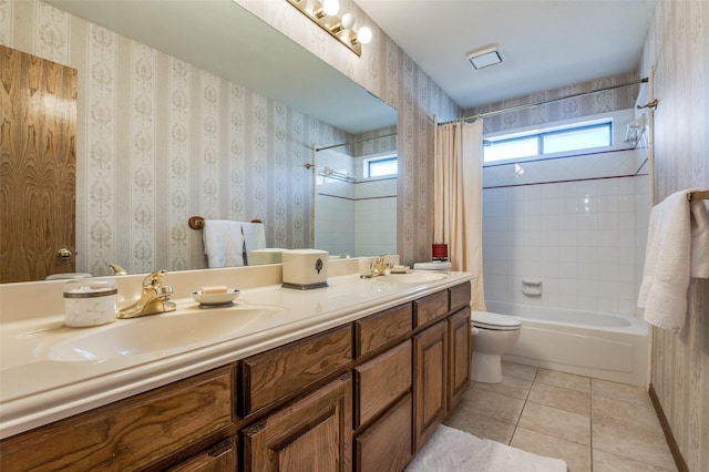 bathroom featuring tile patterned floors, a sink, toilet, and wallpapered walls