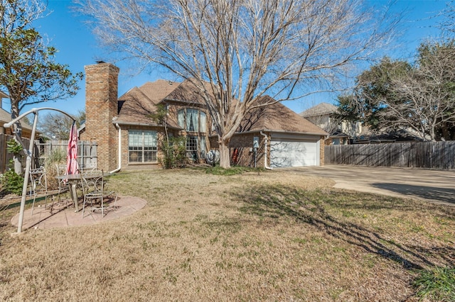 view of front of property featuring brick siding, a chimney, concrete driveway, an attached garage, and fence