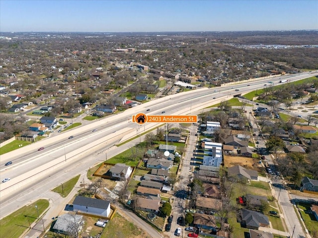 birds eye view of property with a residential view